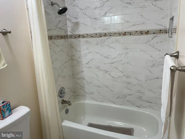 a bathroom with a bathtub