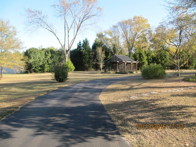 1748 Fred Hall Road Gordon, GA 31031 - Photo 11 of 28 a house with view of trees in front of it