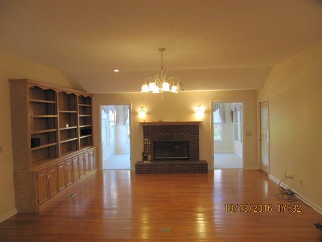 1748 Fred Hall Road Gordon, GA 31031 - Photo 17 of 28 a view of a livingroom with furniture window and wooden floor