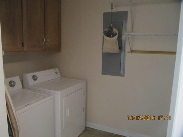 1748 Fred Hall Road Gordon, GA 31031 - Photo 24 of 28 a utility room with dryer and washer