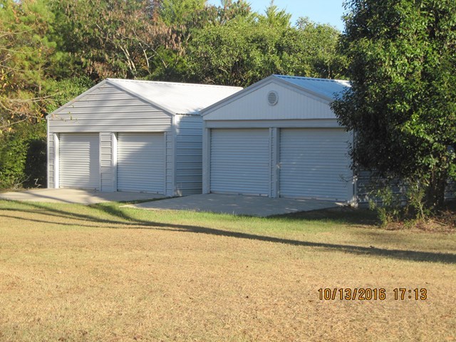 1748 Fred Hall Road Gordon, GA 31031 - Photo 4 of 28 a backyard of a house