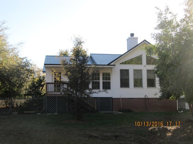 1748 Fred Hall Road Gordon, GA 31031 - Photo 7 of 28 a front view of a house with a garden