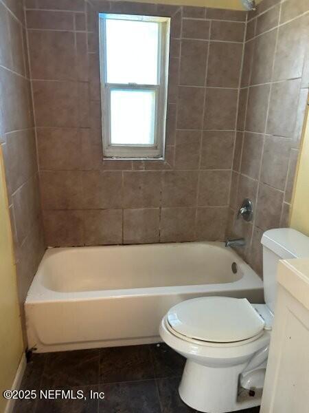 4117 Santee Road Jacksonville, FL 32209 - Photo 12 of 47 a bathroom with a white bathtub and toilet