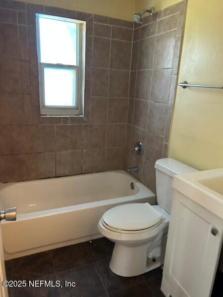 4117 Santee Road Jacksonville, FL 32209 - Photo 17 of 47 a bathroom with a toilet and a bath tub