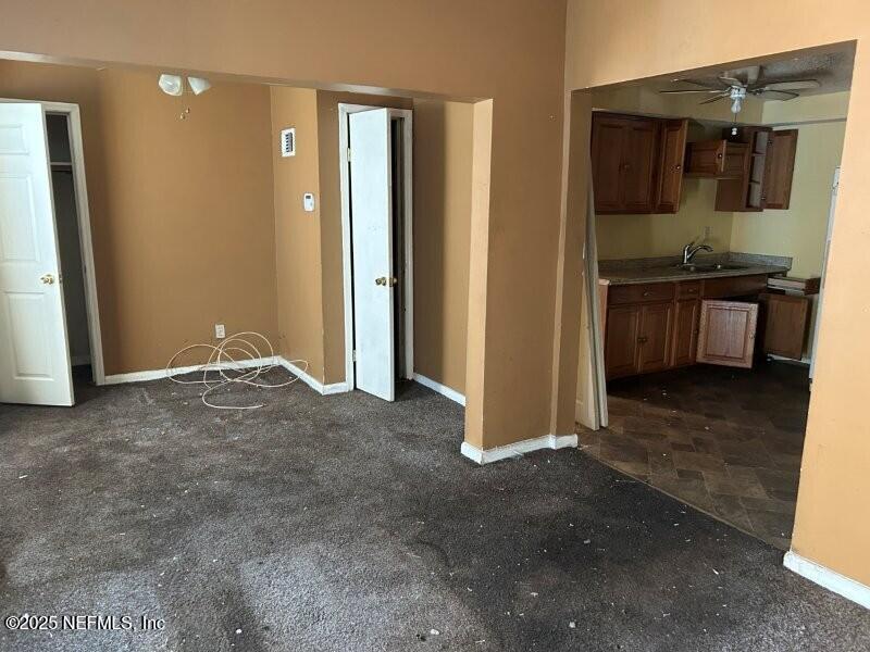 4117 Santee Road Jacksonville, FL 32209 - Photo 2 of 47 a view of room with kitchen view and a window