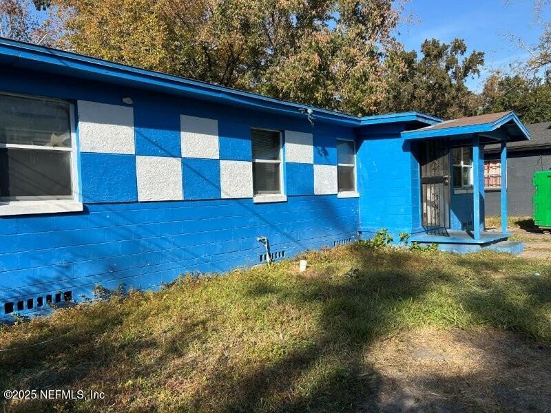 4117 Santee Road Jacksonville, FL 32209 - Photo 36 of 47 a view of a house with a yard