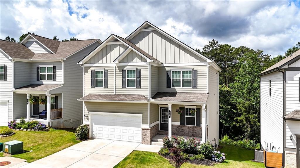 56 Preserve Point Jasper, GA 30143 - Photo 1 of 49 a front view of a house with garden