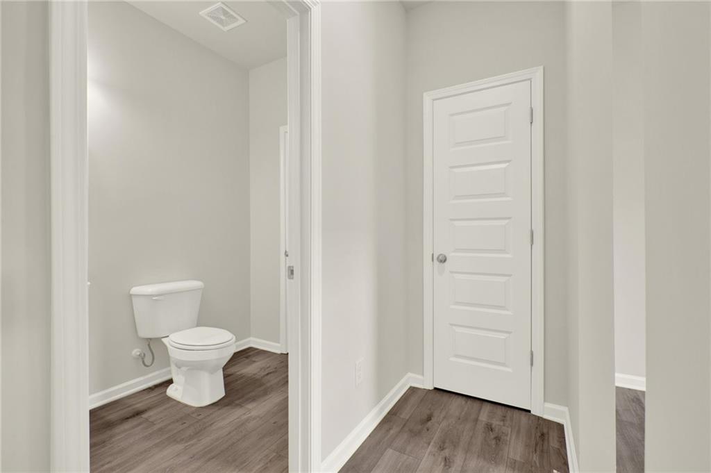 56 Preserve Point Jasper, GA 30143 - Photo 14 of 49 a bathroom with a toilet and a view of bathroom