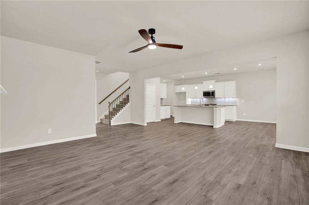 56 Preserve Point Jasper, GA 30143 - Photo 17 of 49 a view of kitchen and hall with wooden floor
