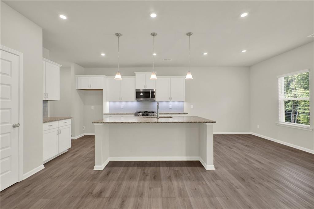 56 Preserve Point Jasper, GA 30143 - Photo 19 of 49 a large kitchen with stainless steel appliances lots of counter space and a sink