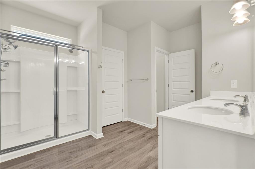 56 Preserve Point Jasper, GA 30143 - Photo 33 of 49 a bathroom with a sink and a mirror