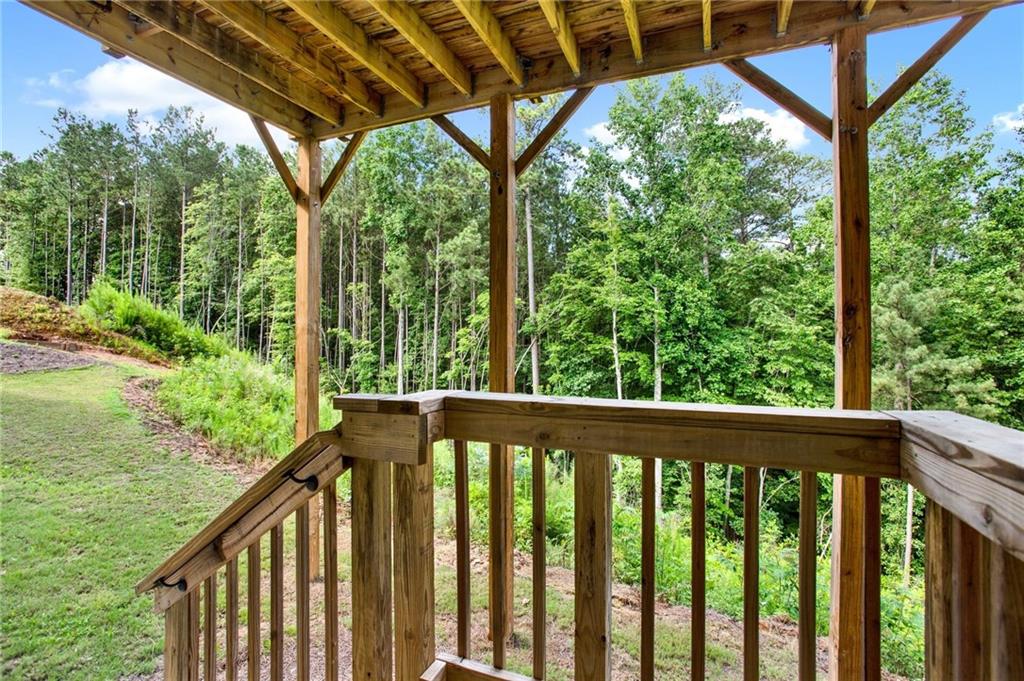 56 Preserve Point Jasper, GA 30143 - Photo 48 of 49 a view of a wooden deck next to a yard
