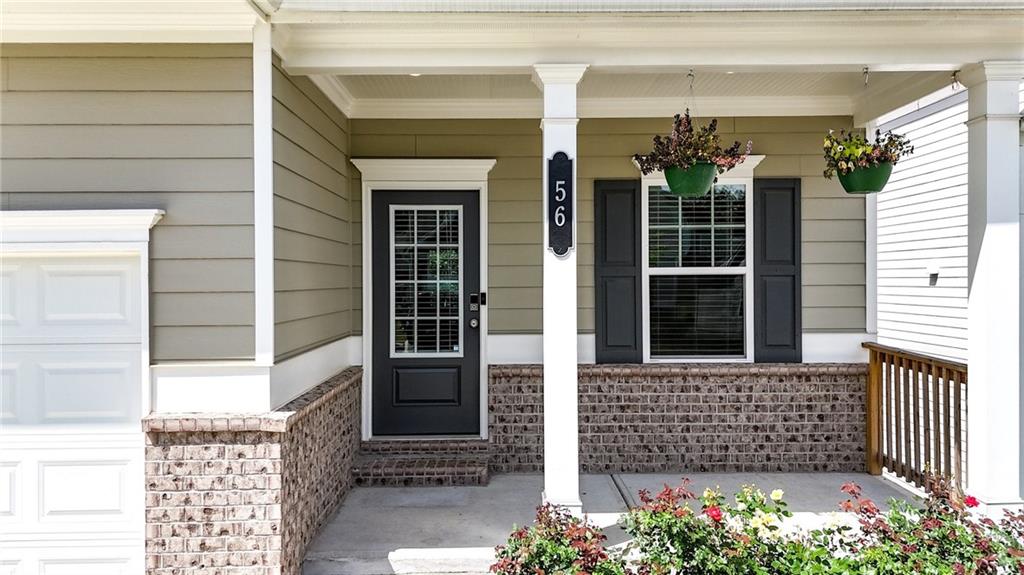 56 Preserve Point Jasper, GA 30143 - Photo 5 of 49 a front view of a house with a garden