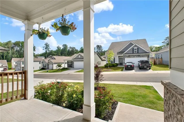 a view of gallery with wooden floor