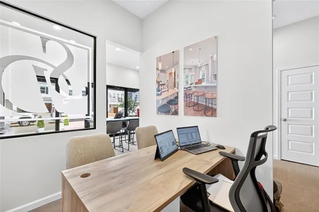 a workspace with furniture and window