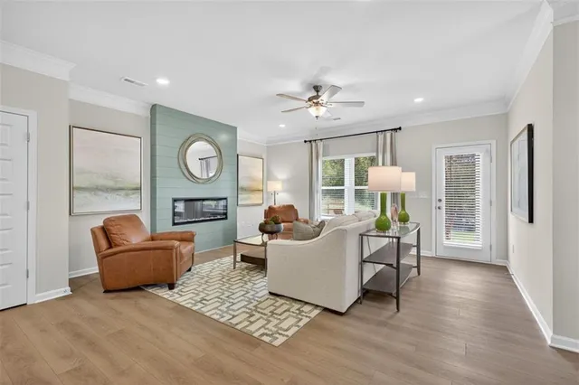 a living room with furniture and a window