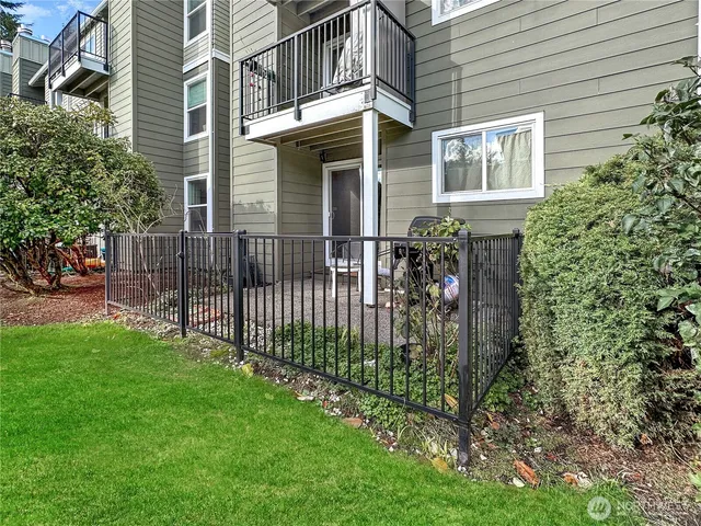 a living room with a bench next to a window