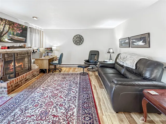 a spacious bedroom with a large bed and a couch