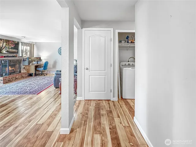 a kitchen with stainless steel appliances granite countertop a refrigerator sink and stove