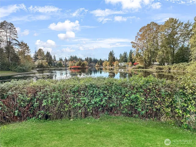 a view of a golf course with a lake