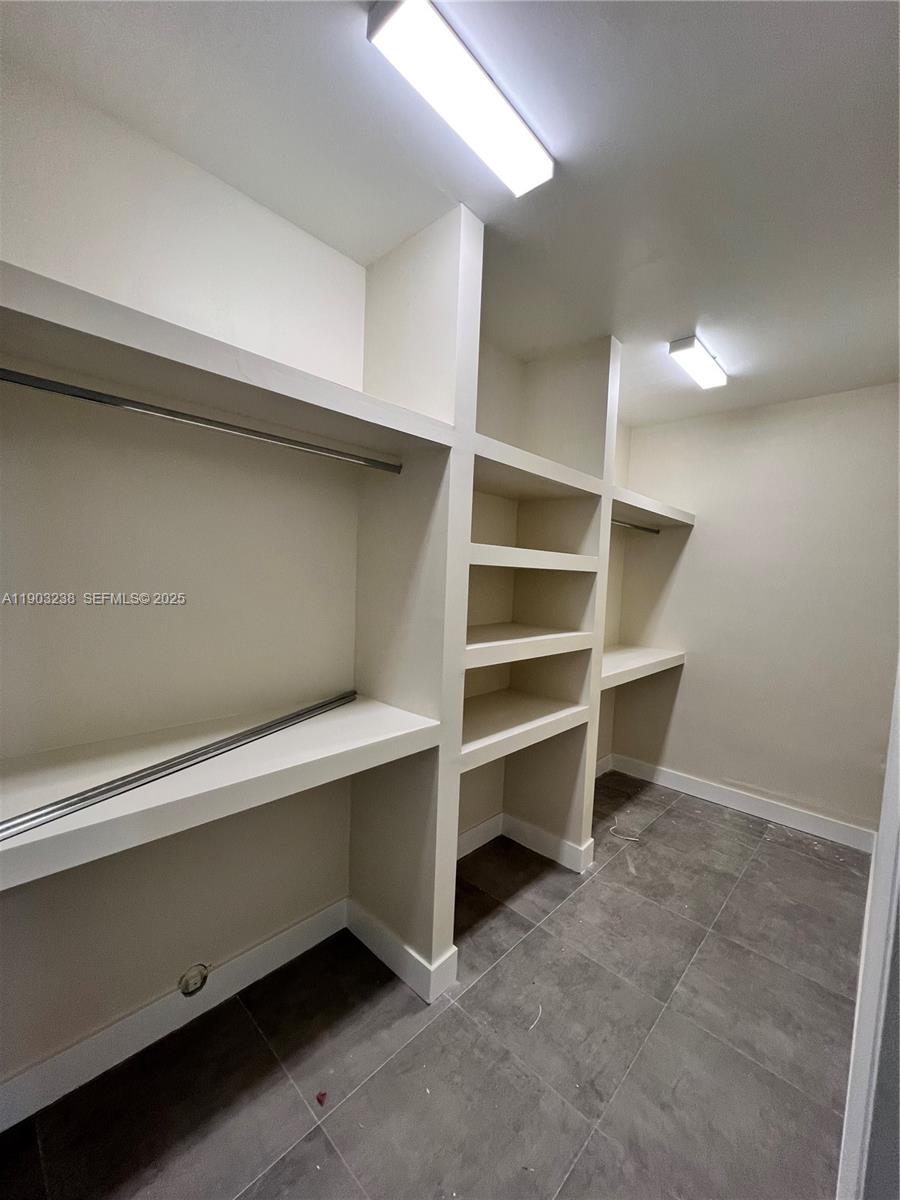 10274 Southwest 180th Street, Unit 1 Miami, FL 33157 - Photo 11 of 17 a view of an empty walk in closet