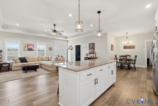 15305 Keelers Mill Road Dewitt, VA 23840 - Photo 38 of 38 a large living room with furniture and a wooden floor