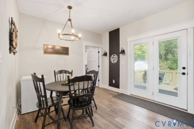 15305 Keelers Mill Road Dewitt, VA 23840 - Photo 13 of 38 a view of a dining room with furniture window and wooden floor