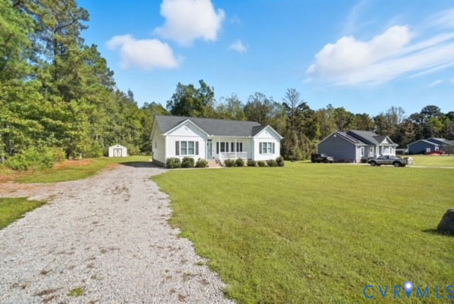 15305 Keelers Mill Road Dewitt, VA 23840 - Photo 3 of 38 a view of house that has a yard