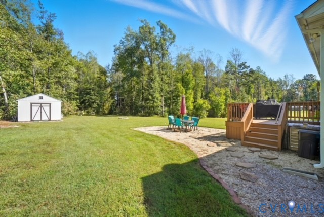 15305 Keelers Mill Road Dewitt, VA 23840 - Photo 32 of 38 a view of a backyard with sitting area
