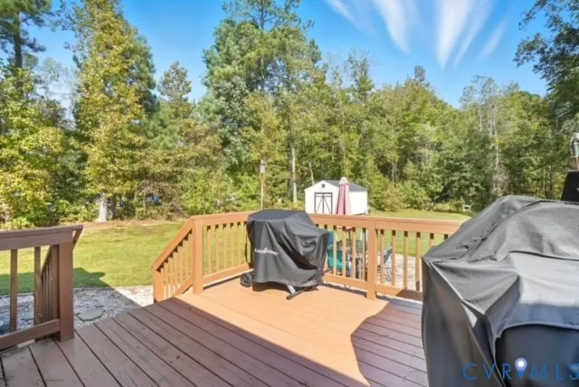 a view of roof deck with furniture