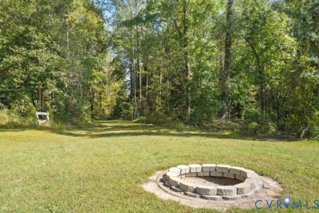 15305 Keelers Mill Road Dewitt, VA 23840 - Photo 34 of 38 a view of a swimming pool with a yard