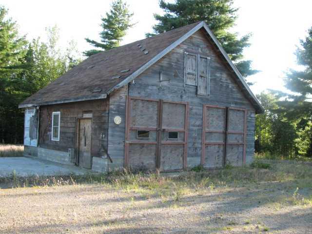 1583 County Road Greenbush, ME 04418 - Photo 10 of 35 Parking Lot/Garage. Two bay older...
