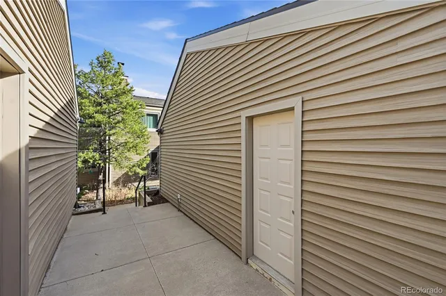 a view of backyard of a house