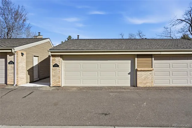 front view of a house with a garage