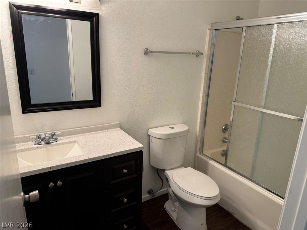 7885 West Flamingo Road, Unit 2171 Las Vegas, NV 89147 - Photo 17 of 22 Well-appointed bathroom features a sleek vanity with ample counter space and a modern shower enclosure.