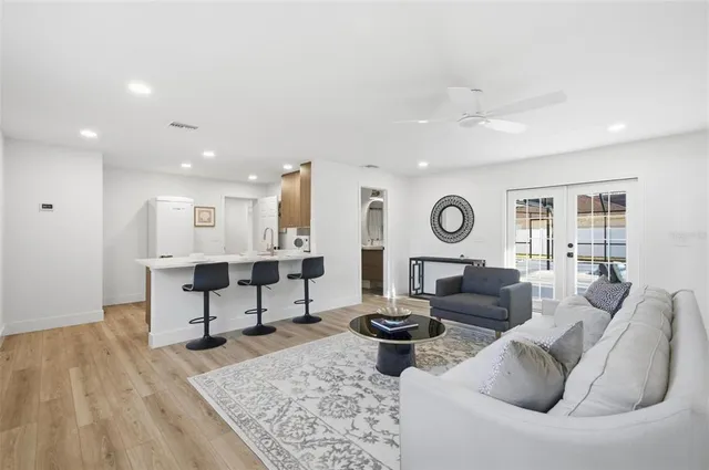 a bathroom with a sink a toilet and tub