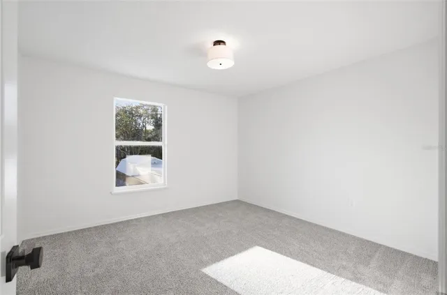 a view of a living room and window