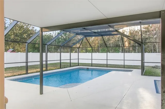 a view of a swimming pool with a roof