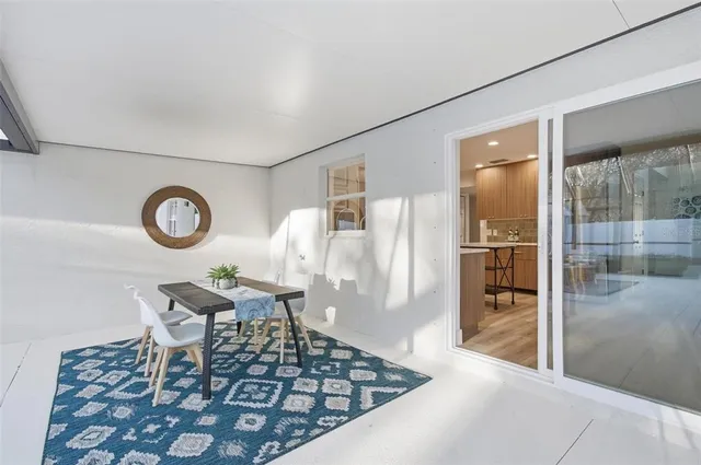 a view of backyard with swimming pool