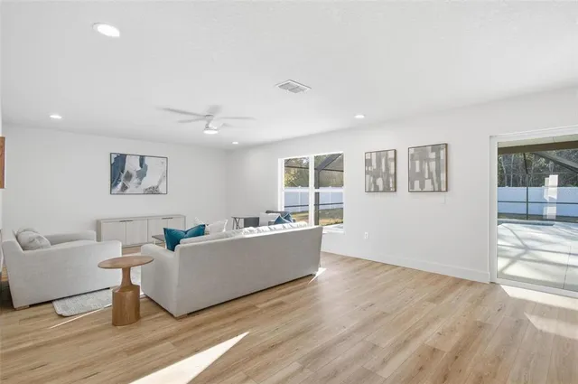 a living room with furniture and window