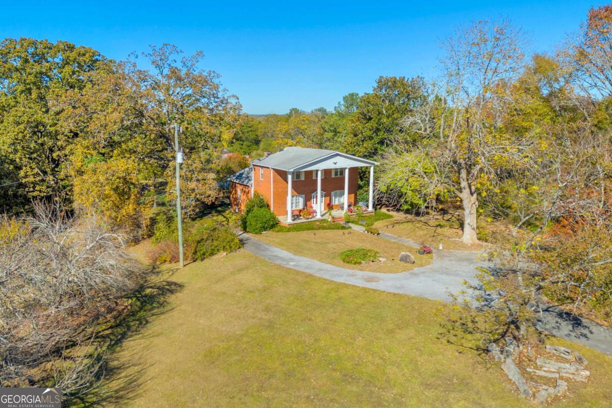 2280 Wilson Road Northwest Conyers, GA 30012 - Photo 14 of 39 a view of a house with a yard