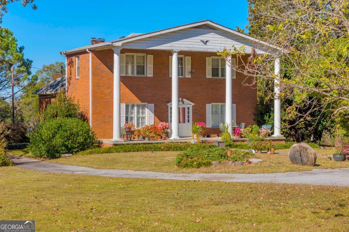 2280 Wilson Road Northwest Conyers, GA 30012 - Photo 30 of 39 a front view of house with yard