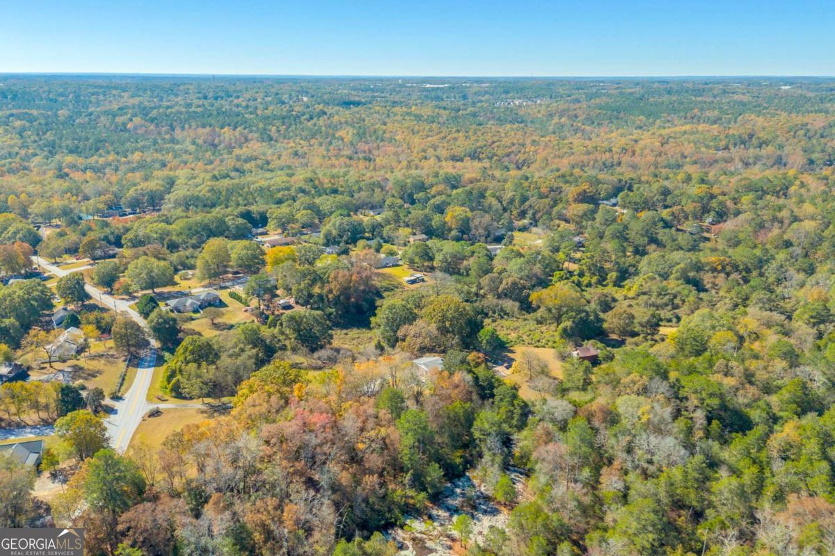 2280 Wilson Road Northwest Conyers, GA 30012 - Photo 37 of 39 an aerial view of residential houses with outdoor space and trees