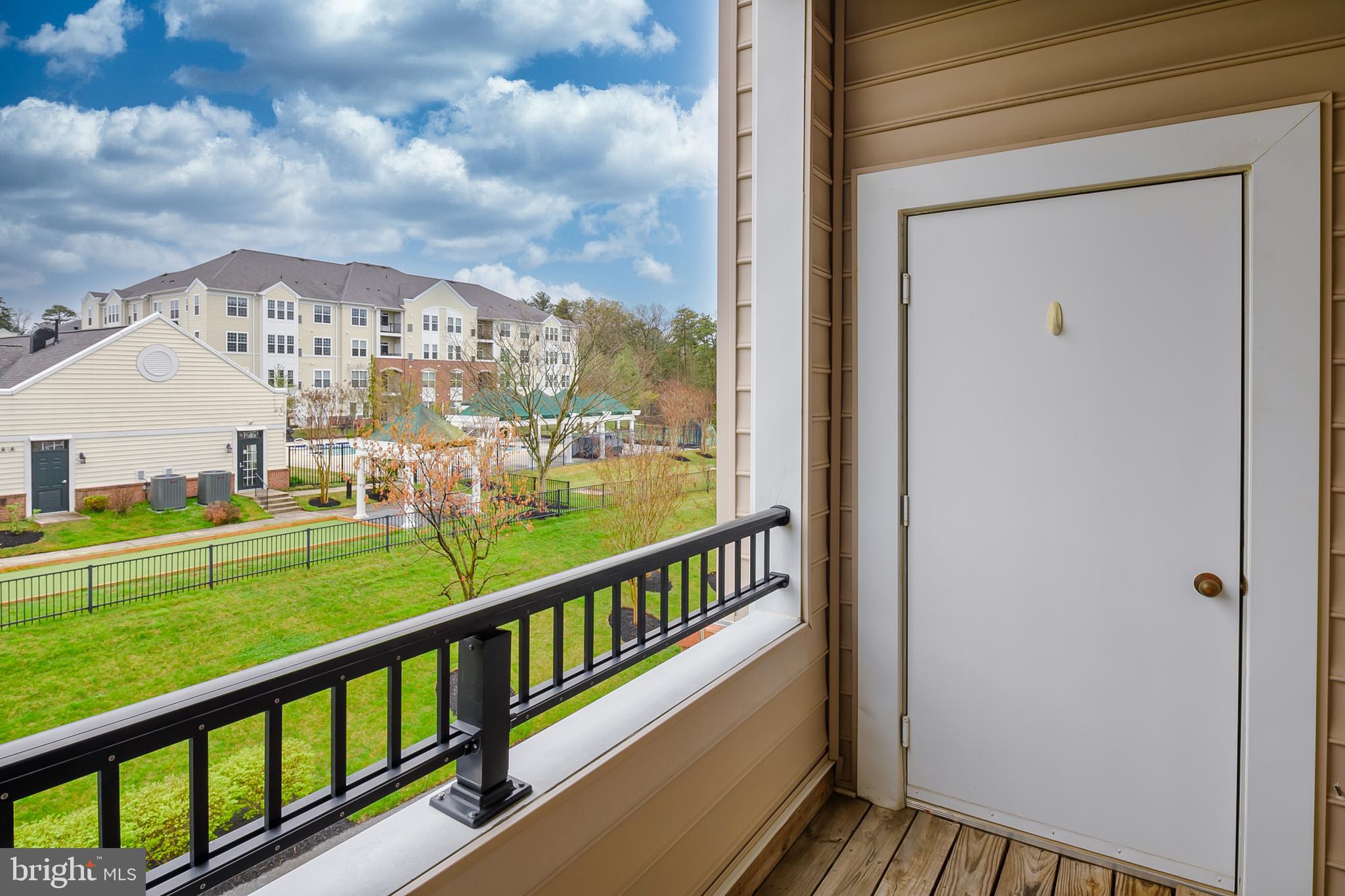 8601 Roaming Ridge Way, Unit 304 Odenton, MD 21113 - Photo 13 of 40 a view of city from a balcony