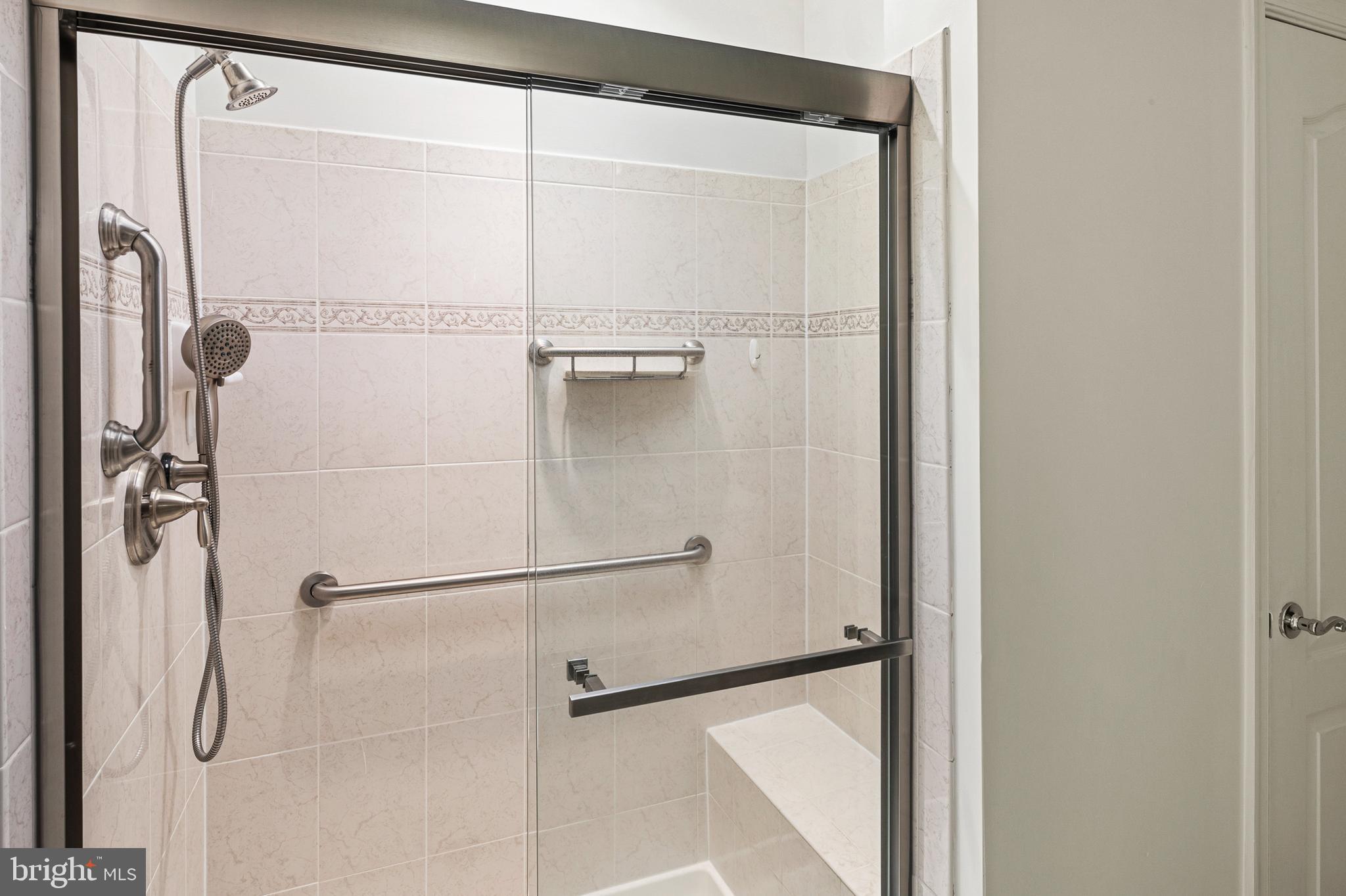 8601 Roaming Ridge Way, Unit 304 Odenton, MD 21113 - Photo 20 of 40 a bathroom with a shower