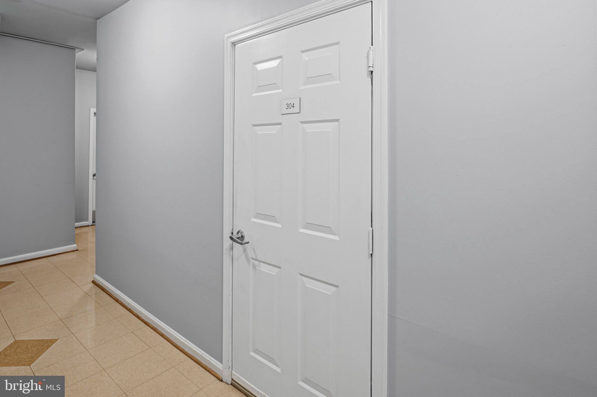 8601 Roaming Ridge Way, Unit 304 Odenton, MD 21113 - Photo 39 of 40 a view of a hallway