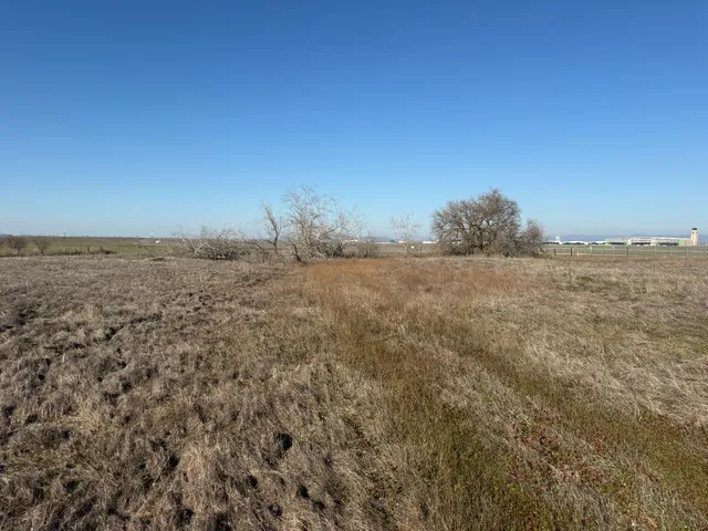a view of beach and an ocean