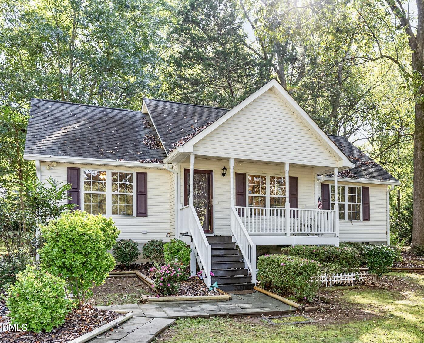front view of a house with a yard