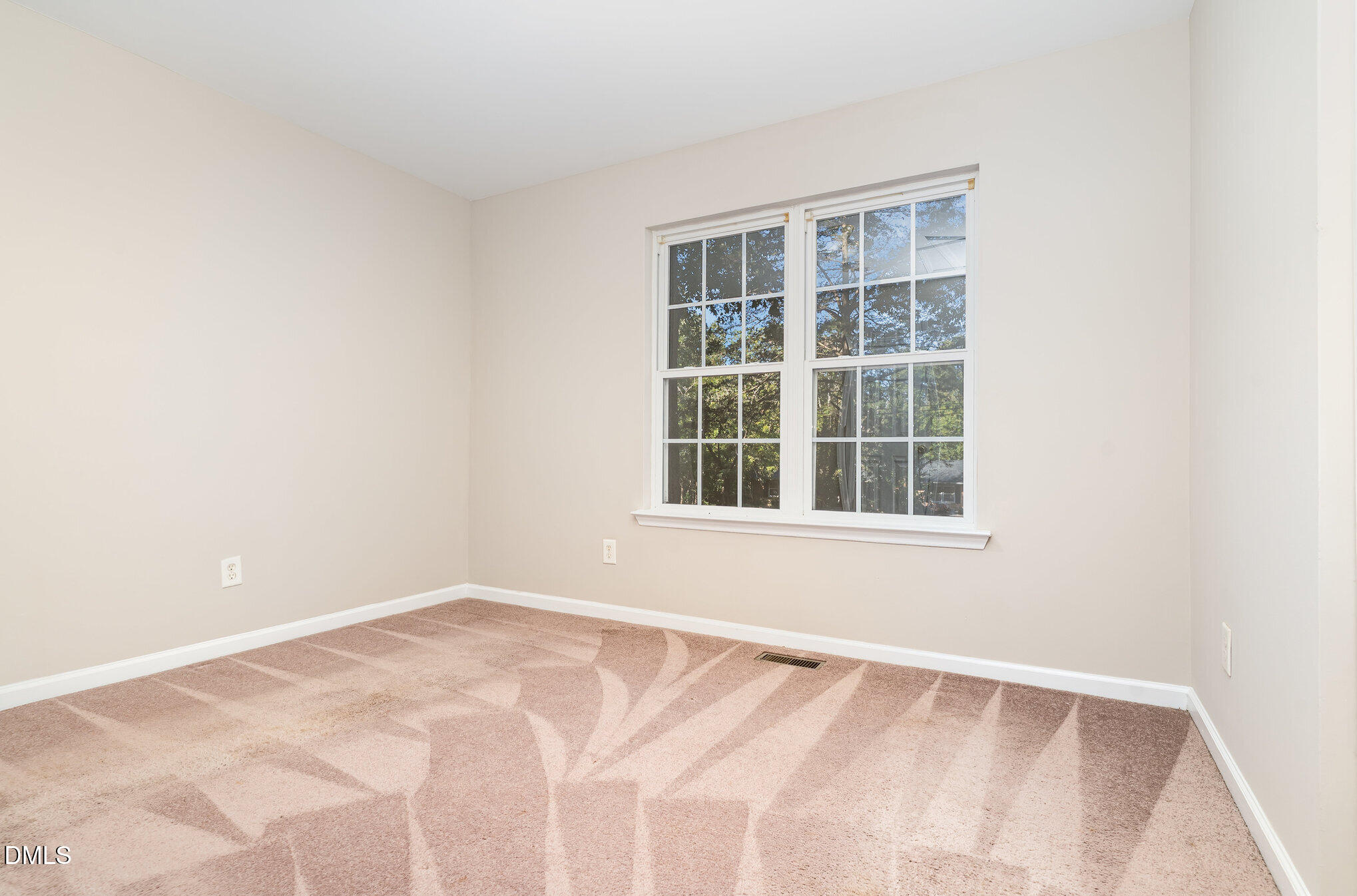 5414 Stanley Road Durham, NC 27704 - Photo 15 of 20 a view of an empty room with a window