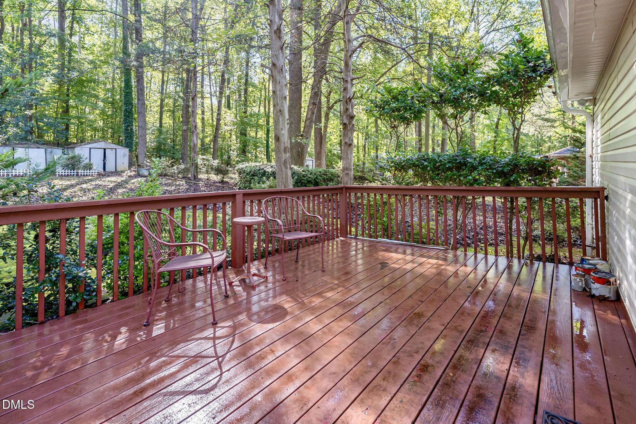 5414 Stanley Road Durham, NC 27704 - Photo 17 of 20 a view of balcony with wooden floor and outdoor seating